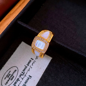 Vintage gold wide ring with mother of pearl inlays and micro-set zircon accents