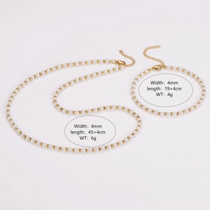 Detail view of vintage pearl and gold bead necklace set with precise size measurements