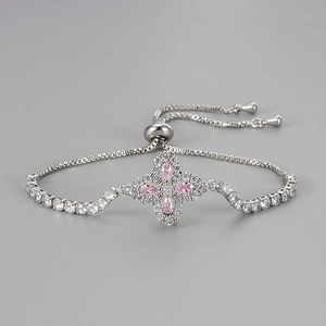 Adjustable silver bracelet with pink zircon flower pendant and glittering crystal accents