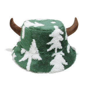 Close-up of plush Christmas tree bucket hat with festive horns and thick fleece texture