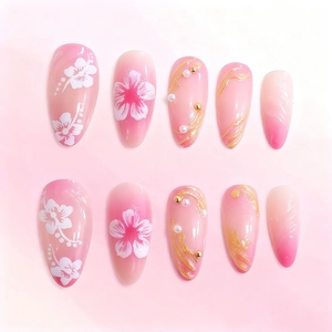 Pink gradient long almond press-on nails with 3D floral art, pearls and gold details