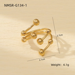 Detailed view showing the 2.7cm x 2.1cm dimensions of the golden spiral beaded ring