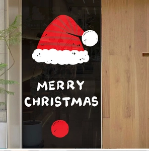 Adesivo natalizio rosso Merry Christmas per vetrine con cappello di Babbo Natale