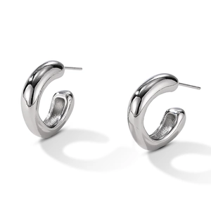Minimalist silver C-shaped chunky hoop earrings with high-polish metallic finish