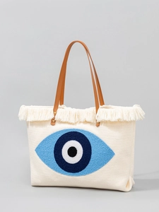 Bohemian canvas tote bag with evil eye embroidery and stylish brown leather handles