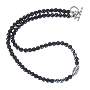 Detail of 6mm black obsidian bead necklace with stainless steel silver OT toggle clasp