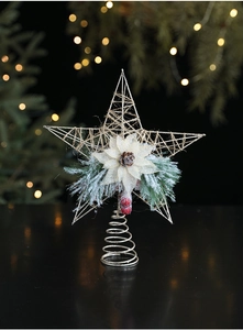 Detailed view of iron Christmas tree star topper with pine cones and red berries decoration