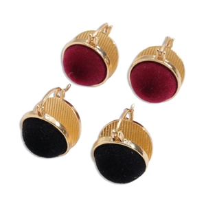 Vintage gold-rimmed geometric round earrings with velvet texture and hoop closure