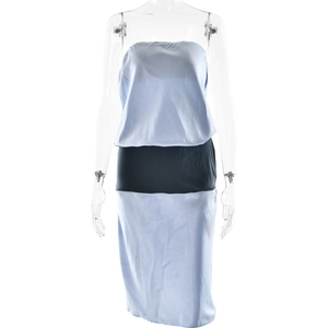 Detail of slim fit bodycon dress with light blue and black satin contrast patchwork