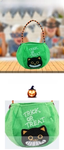 Detail of green plush Halloween cat candy bag with Trick or Treat embroidery