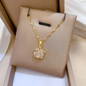 Elegant gold titanium steel double-layer flower necklace set with sparkling zircon crystals