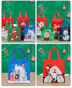 Macro detail of reinforced handles and festive Santa motifs on non-woven Christmas gift bags