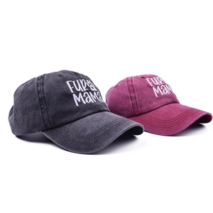 Detail view of Fur Mama embroidery on washed cotton baseball caps in charcoal and wine red