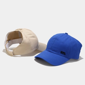 Detail view of cotton ponytail baseball caps with DYL embroidery and adjustable strap back