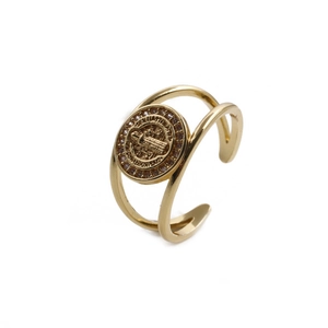 Detail of adjustable gold ring featuring a St. Benedict coin and white micro-zirconia
