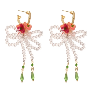 Bohemian floral drop earrings with red resin flowers and green crystal pendants