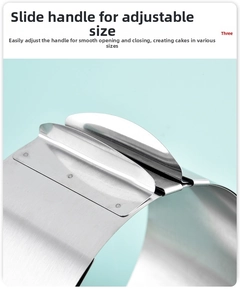 Detail of the adjustable handle on the stainless steel mousse ring for cake size control