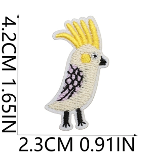 Detailed view of parrot embroidery patch with size measurements 2.3cm x 4.2cm for clothing