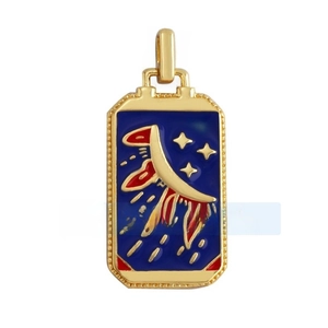 Macro view of blue enamel tarot pendant with golden moon, star, and comet details