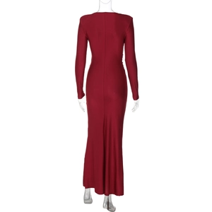 Detailed back view of a slim fit long sleeve evening gown in dark red floor length style
