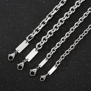 Detailed view of silver stainless steel chains with blank rectangular pendant tags