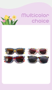 Detail shot of four-pack kids dinosaur sunglasses in various colors for outdoor wear