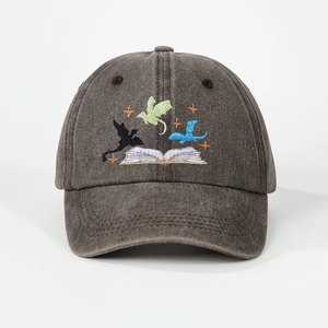 Vintage washed dark brown baseball cap with embroidered dragons flying from a book