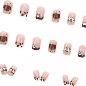 French style short almond nails with cute dog and cat cartoon patterns in nude and brown