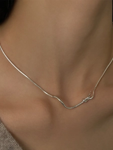 Minimalist 925 sterling silver choker necklace with sleek snake chain on a female model