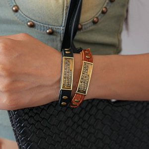 Vintage leather bracelets with engraved metal plates in black and brown styles