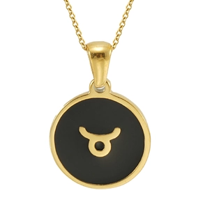 Gros plan du collier doré en acier inoxydable avec pendentif rond noir signe Taureau