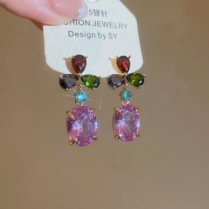 Macro shot of S925 silver needle drop earrings with colorful zircon stones and high brilliance