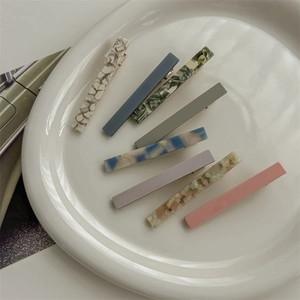 Eight pieces of minimalist acetate hair pins in various floral patterns and solid colors
