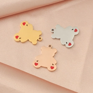 Mirror polished bear charms in gold, silver, and rose gold with tiny red hearts