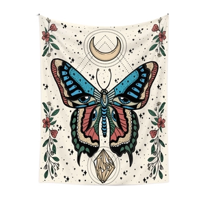 Bohemian butterfly tapestry with celestial moon and floral patterns on white wall