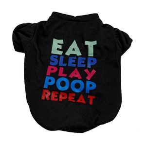 Close-up of black cotton dog vest with colorful Eat Sleep Play Poop Repeat text