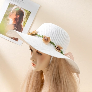 Summer wide brim white straw sun hat with floral wreath and pink silk ribbon