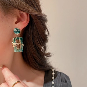 Vintage green acrylic marble earrings with gold metal wrap and rhinestone details