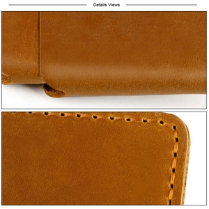Detail view of vintage crazy horse leather card holder with hand-stitched brown texture