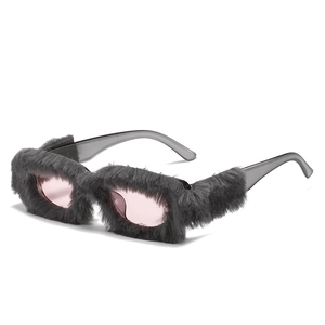 Creative rectangle sunglasses with grey faux fur frame and pink lenses displayed at 45 degrees