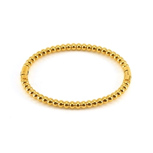 Dettaglio del bracciale in acciaio inossidabile placcato oro con trama di bambù
