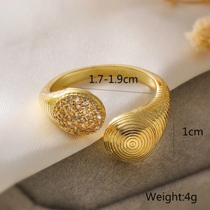 Macro shot of gold adjustable ring showing 1cm width and 1.7-1.9cm inner diameter size