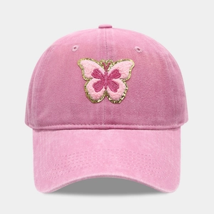Casquette de baseball en coton délavé rose avec broderie papillon vintage