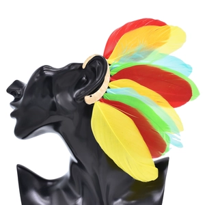 Exaggerated vintage peacock feather ear wrap with colorful plumage on gold alloy base