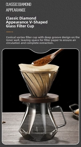 Detail of V-shaped glass coffee dripper on wood base with a diamond cut glass server