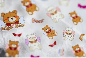 Detail of Angel Bear nail stickers featuring cute winged bears and heart patterns