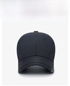 Front view of navy cotton baseball cap featuring a metal buckle and woven side label