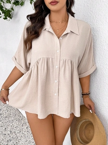 Women's plus size beige peplum blouse with textured fabric and button front design