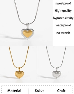 Detail showing gold and silver heart pendants with sweatproof and waterproof features