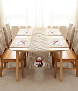 Nine-piece Christmas table set with snowman embroidery on beige linen fabric for decor